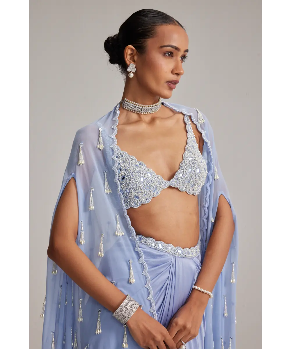 VVANI VATS- Dew Blue Cape And Satin draped skirt Set